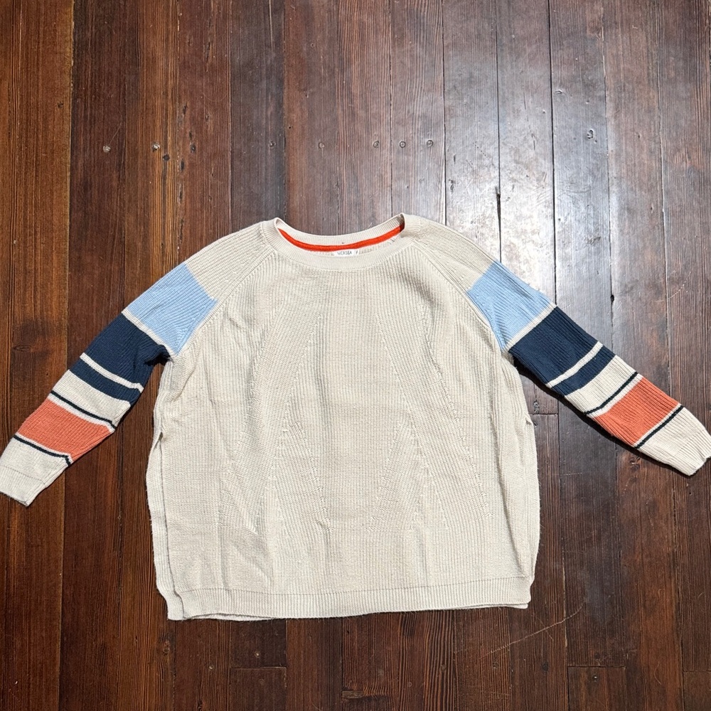 Women’s Colorblock Sleeve Sweater with slit sides and buttons up back